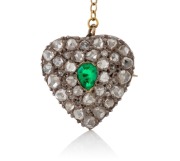 An antique heart brooch, pave set with old fashion rose cut diamonds and green stone, mounted in silver and rose gold with later gold safety chain, 19th century, ​​​​​​​1.7cm high, 3.9 grams total