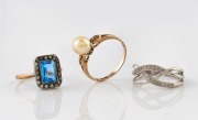 A 9ct white gold and diamond ring, a 10ct gold, pearl and diamond ring, and a 9ct gold ring with blue and white stones, (3 items), ​​​​​​​8 grams total