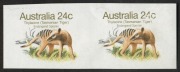 1981 24c Thylacine (Tasmanian Tiger), completely imperforate horizontal pair, (2), MUH. SG.788a; BW:902b.