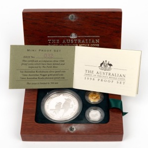 THE 1998 AUSTRALIAN FAMILY OF PRECIOUS METALS SET OF MINI PROOF COINS: comprising of a $1 (1oz) Australian Kookaburra silver Proof, a $5 (1/20oz) pure gold Australian Nugget Proof, and a $5 (1/20oz) platinum Koala Proof, all beautifully presented in a felt-lined timber case and accompanied by the Certificate of Authenticity identifying this as set No.032 of only 700 produced.