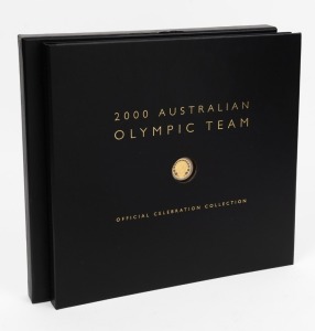 2000 Australian Olympic Team Official Celebration Collection large format book, with a $100 GOLD proof "Achievement" and 10 x $5 bronze "Gold Medal Sports" coins. Issued by the Perth Mint . This is set No. 0136 of 2000. With statements by the leading Olympians and recording all Australian participants and their results. A most attractive presentation.