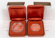 The Australian Kookaburra 2002 Proof Issue - TWO OUNCE and ONE OUNCE coins, each in their individual presentation case produced by The Perth Mint. With individual Certificates of Authenticity. (2 items).