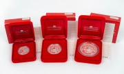2000 YEAR OF THE DRAGON: AUSTRALIAN LUNAR SILVER COIN PROOF SERIES of three coins, comprising of the $2 (2oz), the $1 (1oz) and the 50c (&frac12;oz), all depicting a dragon gazing at a pearl; each in their original felt-lined red case of issue and accompanied by