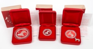 2006 YEAR OF THE DOG: AUSTRALIAN LUNAR SILVER COIN PROOF SERIES of three coins, comprising of the $2 (2oz), the $1 (1oz) and the 50c (½oz), all depicting a Golden Retriever; each in their original felt-lined red case of issue and accompanied by a Certificate of Authenticity. (3 coins)