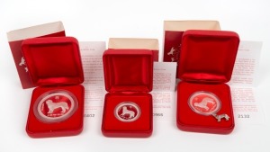2006 YEAR OF THE DOG: AUSTRALIAN LUNAR SILVER COIN PROOF SERIES of three coins, comprising of the $2 (2oz), the $1 (1oz) and the 50c (½oz), all depicting a Golden Retriever; each in their original felt-lined red case of issue and accompanied by a Certificate of Authenticity. (3 coins)