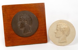A bronze medallion of Charles La Trobe, after the image by Thomas Woolner; together with a plaster impression of the same medallion; both 75mm diameter. (2 items; the first mounted on a wooden stand).