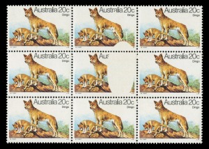 1980 (SG.729) 20c Dingo, blk.(9), two units with striking oval-shaped flaw resulting in a significant portion of the design and "stralia 20c Dingo" being completely absent from one unit and a smaller portion missing from the unit above. Possibly unique. MUH.
