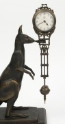 A reproduction Mystery "Kangaroo" swinging clock, 29cm high - 2