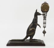 A reproduction Mystery "Kangaroo" swinging clock, 29cm high - 3