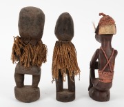 Three tribal statues, carved wood, fibre and tooth with earth pigments, African origin, the largest 22cm high - 3
