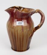 REMUED&nbsp;large pink and brown pottery jug with branch handle (A/F), together with a REMUED ashtray, vase, jug and basket vase, (5 items), the largest 25cm high - 2