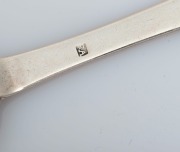 Four antique CHANNEL ISLANDS silver&nbsp;trefid spoons, 18th century, marks illegible but two possibly by PIERRE AMIRAUX, approximately 17.5cm long, 108 grams total - 4