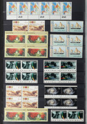 Large red Lighthouse hingeless album housing a decimal period collection in blocks and strips, with values to $2. (100s) MUH. FV: $850+.