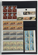 Large red Lighthouse hingeless album housing a decimal period collection in blocks and strips, with values to $2. (100s) MUH. FV: $850+. - 3