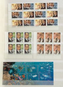 Large black Lighthouse hingeless album containing a decimal period collection in blocks and strips, with values to $10. (100s) MUH. FV: $1,100+.