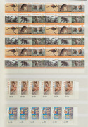 Large black Lighthouse hingeless album containing a decimal period collection in blocks and strips, with values to $10. (100s) MUH. FV: $1,100+. - 3