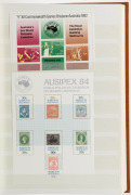 A large tan coloured Lighthouse stockbook containing a decimal period collection in strips, blocks and Miniature Sheets with values to $1, (100s) MUH. FV: $450+. - 2