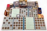 An accumulation of assorted coins and stamps