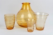 WHITEFRIARS&nbsp;four&nbsp;English golden amber glass vases with ribbon trail decoration, designed by Barnaby Powell, mid 20th century, the largest 33cm high