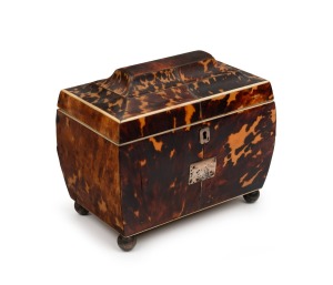 A fine quality Georgian bombe shaped tortoise shell tea caddy with double curvetto lid, silver bun feet, escutcheon and name plate, plus ivory trim. Interior fitted with two lidded compartments, circa 1800, 14.5cm high, 17.5cm wide, 11cm deep.
