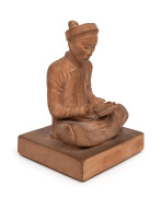 GEORGES-DENYS DUTHEIL (French, 1888-1962), Vietnamese scholar seated studying, in traditional costume, circa 1930, signed on the plinth, terracotta, 22cm high