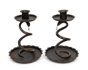 A pair of antique German blackened steel snake candlesticks, stamped "Hoffman 23, Germany", 18cm high