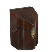 A Georgian mahogany cutlery box with double serpentine front and sloped top, late 18th century, 34cm high, 23cm wide, 22cm deep