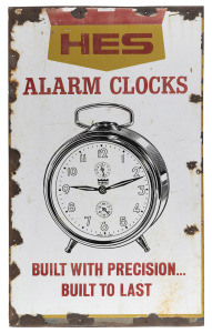 "HES ALARM CLOCKS" vintage tin enamel advertising sign, 20th century, ​​​​​​​76 x 46cm.