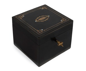192 · An antique French tea caddy with ebonised finish, inlaid with brass and mother of pearl, 19th century, 11cm high, 12.5cm, wide, 12cm deep