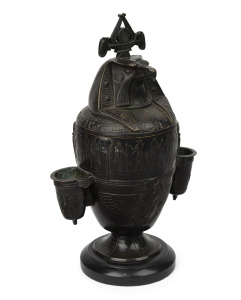 An Egyptian revival bronze table cigar holder, early to mid 19th century, 29cm high