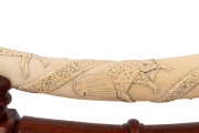 A pair of carved African ivory tusk ornaments mounted in sterling silver and presented on later carved timber stands, 60cm each - 3