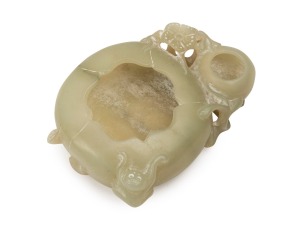 An antique Chinese carved jade brush washer, in pale celadon pebble jade from the Yurang-Kash river, Qianlong Period, 1736-1795, 10cm wide