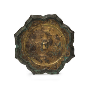 Tang Dynasty (618-906) fine quality antique Chinese bronze hand-mirror with remains of original gilt decoration, adorned with animals and flying birds, 12.5cm wide