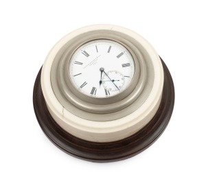 MINOAH BRODES & SON of Bradford antique English desk clock in ivory mount on a timber plinth, 19th century, 10cm diameter overall.