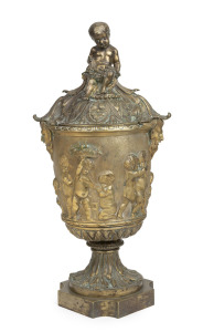 An antique French gilt bronze lidded mantle urn with cherub decoration, 19th century, ​​​​​​​42cm high.