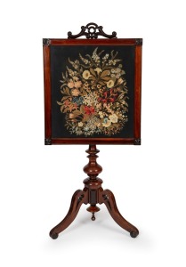 An antique English rosewood and mahogany fire screen on pedestal base with ornate hand stitched silk floral embroidery, 19th century, 116cm high