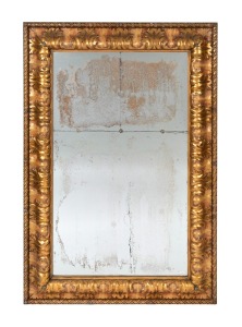 An ornate gilt framed pier mirror with segmented glass, 20th century, ​​​​​​​137 x 92cm overall.