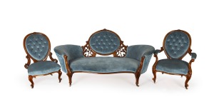 A fine quality antique English carved walnut three piece salon suite, upholstered in blue velvet with button backing, 19th century, ​​​​​​​the settee 195cm across the arms
