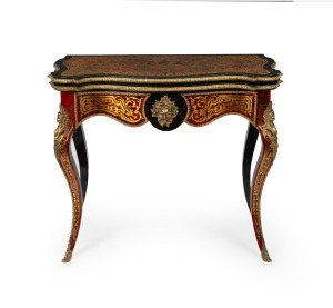An antique French boulle fold-over games table, 19th century, 79cm high, 92cm wide, 46cm deep