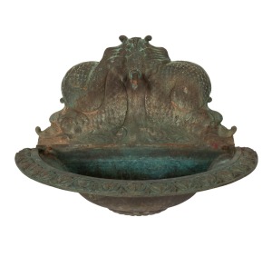AUGUSTUS WALL FOUNTAIN impressive vintage cast bronze garden wall fountain, the cistern with egg and dart decoration, the font back with symmetrical marine grotesques, green verdigris patination, 73cm high, 110cm wide, 54cm deep.