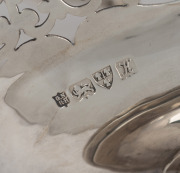 An antique pierced sterling silver cake basket, inset with Queen Anne silver crowns, made by George Nathan & Ridley Hayes of Chester, circa 1910, ​​​​​​​31cm high, 34cm wide, 673 grams - 2