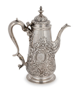 30 · A Georgian sterling silver coffee pot with ornate floral repousse decoration and engraved rampant lion family crest, marks rubbed, 23cm high, 693 grams