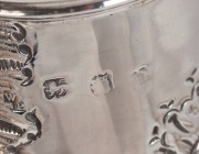 A Georgian sterling silver coffee pot with ornate floral repousse decoration and engraved rampant lion family crest, marks rubbed, 23cm high, 693 grams - 3