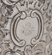 A Georgian sterling silver coffee pot with ornate floral repousse decoration and engraved rampant lion family crest, marks rubbed, 23cm high, 693 grams - 4