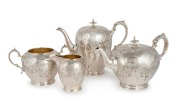 An antique English sterling silver four piece tea and coffee service with engraved Rococo&nbsp;revival decoration and remains of original gilt wash interior, made in London, circa 1842, the coffee pot 20cm high, 2,130 grams total