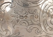 An antique English sterling silver four piece tea and coffee service with engraved Rococo&nbsp;revival decoration and remains of original gilt wash interior, made in London, circa 1842, the coffee pot 20cm high, 2,130 grams total - 2