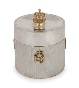 135 · "THE SILVER WEDDING OF THE QUEEN & THE DUKE OF EDINBURGH, 1947- 20th NOVEMBER, 1972" English sterling silver tea caddy with royal cyphers and crown finial finished in gilt decorated highlights, 13cm high, 11cm diameter, 517 grams