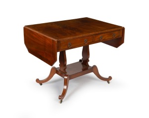 An antique English mahogany Regency sofa table with drop-sides, circa 1825. Fully refurbished and restored. 72cm high, 92cm wide (extends to 145cm), 64cm deep.