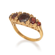 An impressive antique 9ct gold and garnet ring, 19th century, 3.4 grams