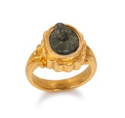 A 22ct gold ring, set with a carved hardstone cameo, unknown age and origin, ​​​​​​​8.9 grams total.